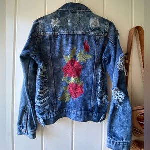 Jean jacket with tears and rose embroidery